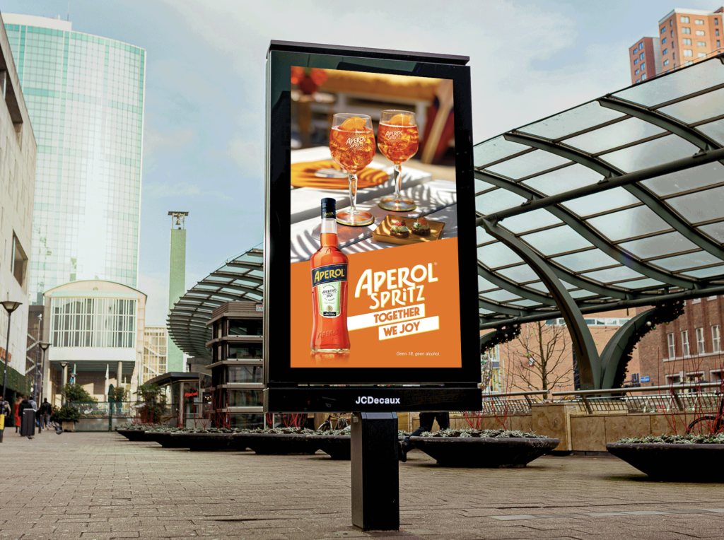JCDecaux out of home screen aperol weather based buying